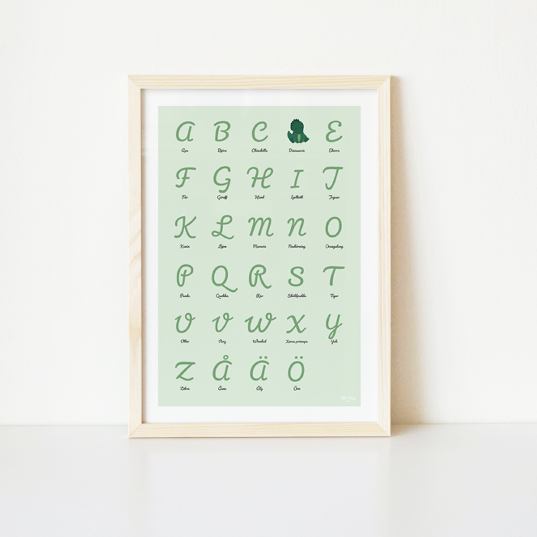 Grön ABC-poster med dinosaurie i träram